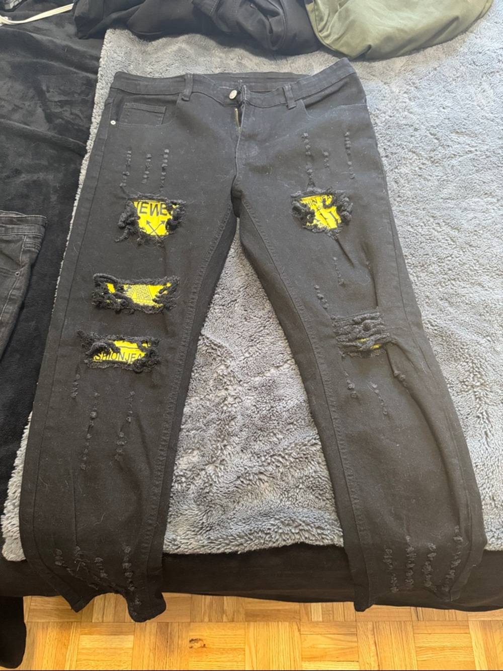 Men’s Black Distressed Jeans with Yellow Patch Detail